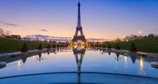 Frozen reflections in Paris. Eiffel Tower at sunrise from Trocadero Fountains e1492262386545