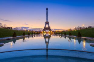 Frozen reflections in Paris. Eiffel Tower at sunrise from Trocadero Fountains e1492262386545