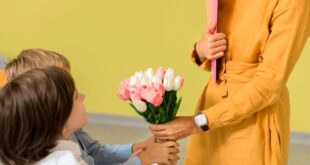 children giving their teacher bouquet flowers 23 2148668542