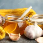 composition-with-garlic-other-cold-remedies-grey-table_495423-57836