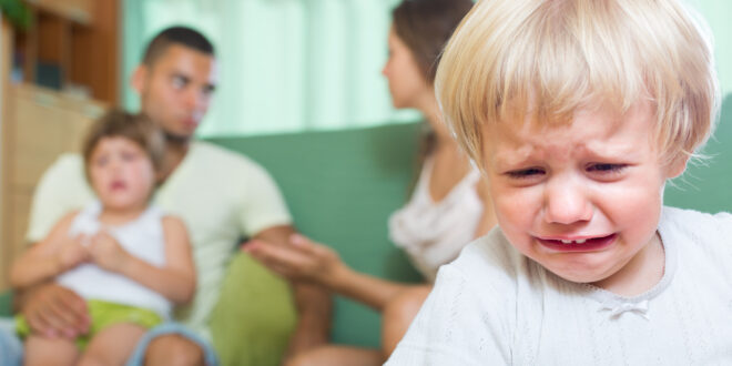 couple with children having quarrel