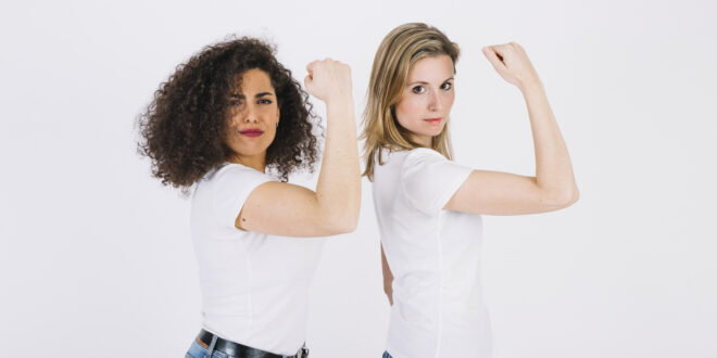 young women showing biceps