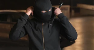 close up man trying break into car 1